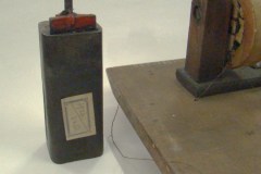 Battery and induction coil